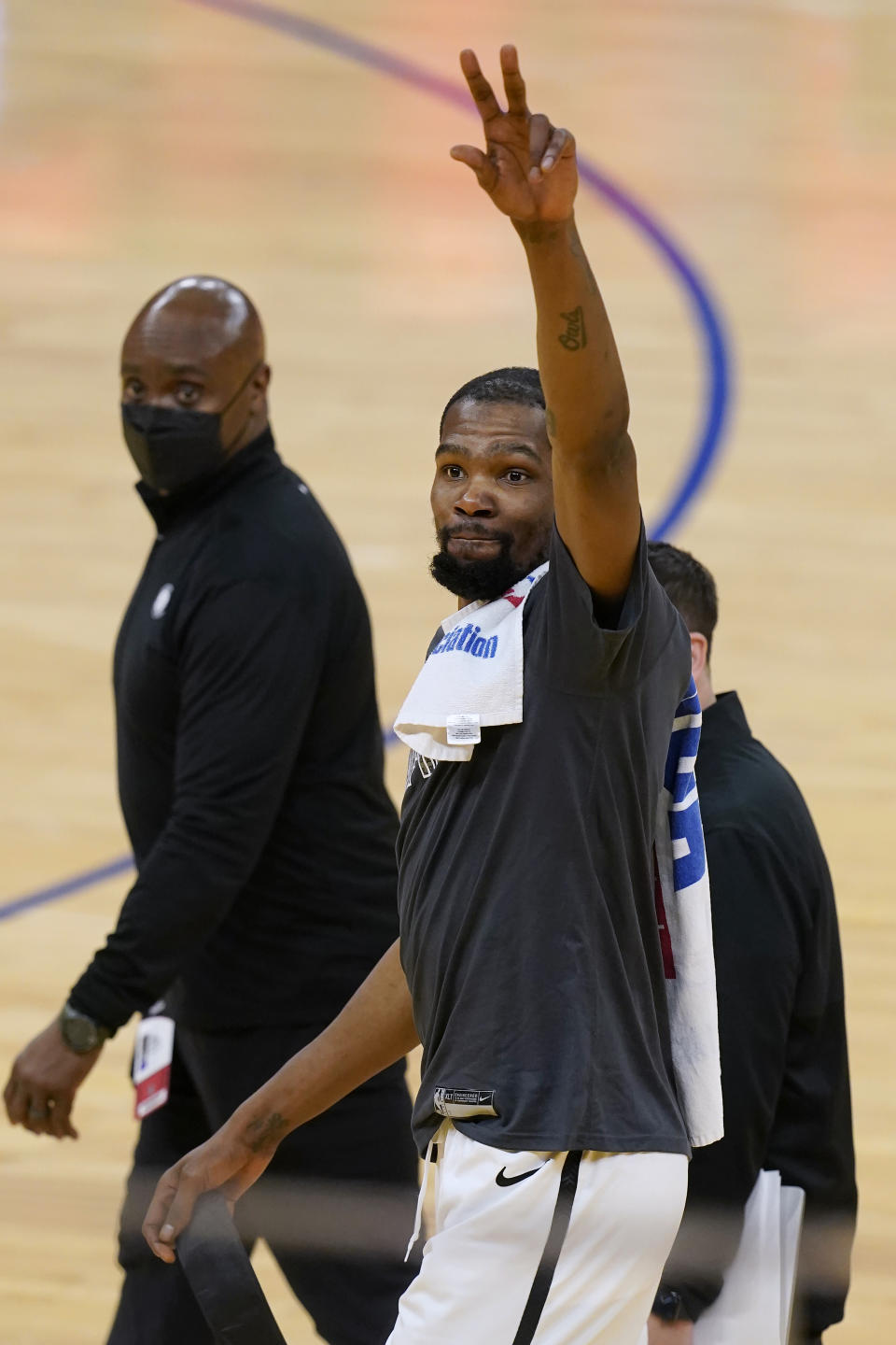 Brooklyn Nets forward Kevin Durant waves after the Nets defeated the Golden State Warriors in an NBA basketball game in San Francisco, Saturday, Feb. 13, 2021. (AP Photo/Jeff Chiu)