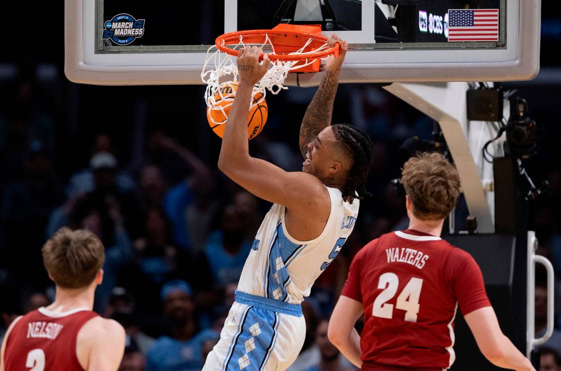 North Carolina’s Armando Bacot (5) gets a dunk over Alabama’s Rylan Griffen (3) and Sam Walters (24) in the second half in the NCAA Sweet Sixteen on Thursday, March 28, 2024 at Crypto.com Arena in Los Angeles, CA.