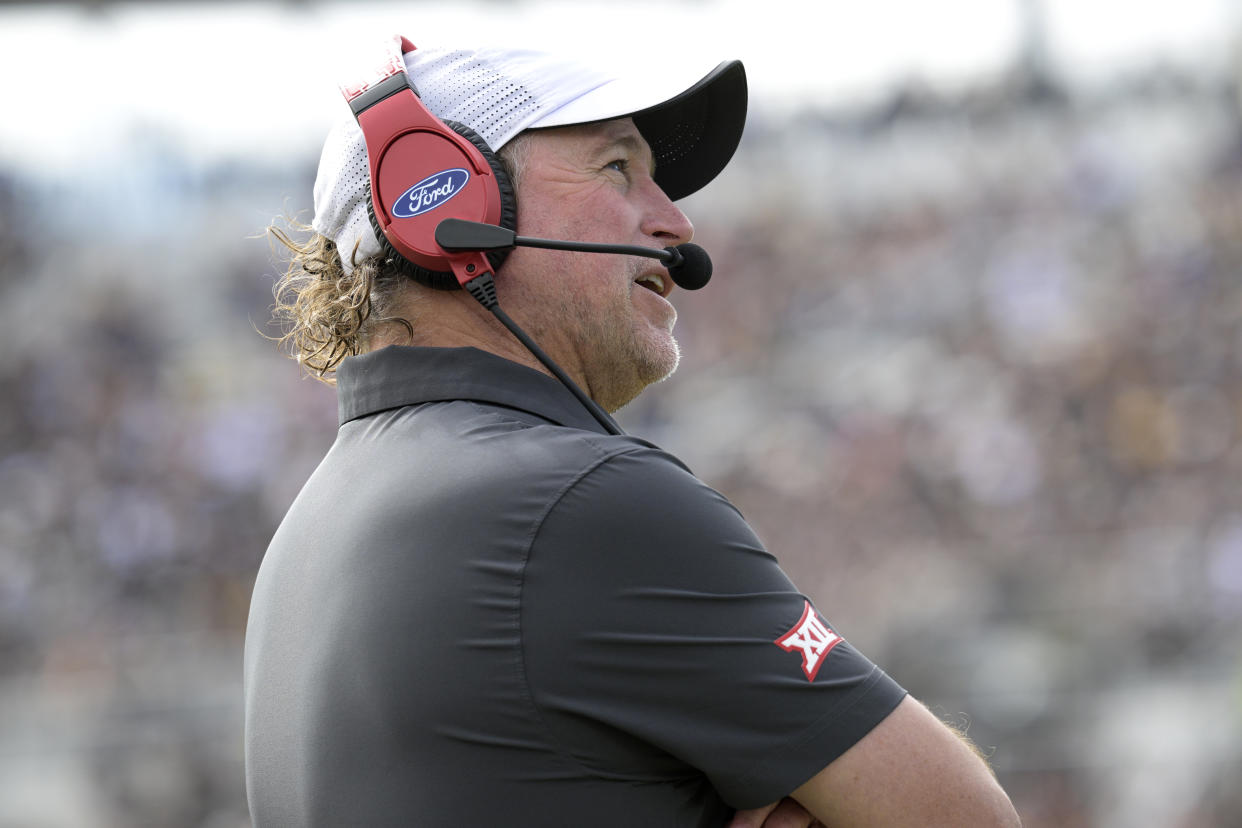Houston head coach Dana Holgorsen watches from the sideline during the first half of an NCAA college football game against Central Florida, Saturday, Nov. 25, 2023, in Orlando, Fla. (AP Photo/Phelan M. Ebenhack)
