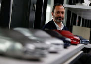 Infiniti, Nissan Motor's premium brand, Executive Design Director Karim Habib poses for a photo behind the brand's car models at its Global Design Center in Atsugi, Japan, April 18, 2018. Picture taken April 18, 2018. REUTERS/Toru Hanai