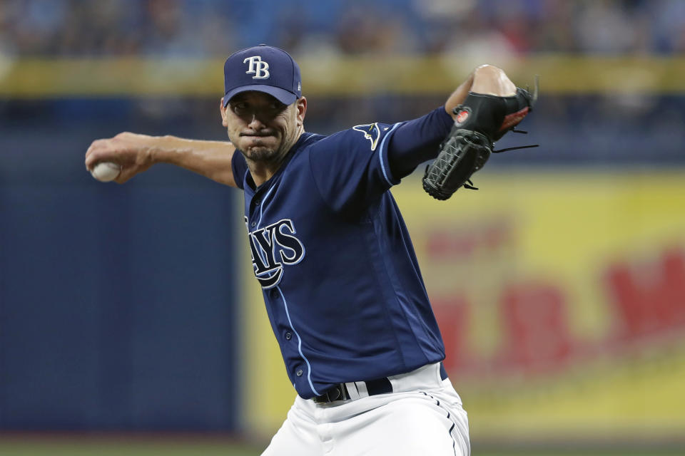 Tampa Bay Rays' Charlie Morton goes into his delivery to the Boston Red Sox during the first inning of a baseball game Wednesday, July 24, 2019, in St. Petersburg, Fla. (AP Photo/Chris O'Meara)