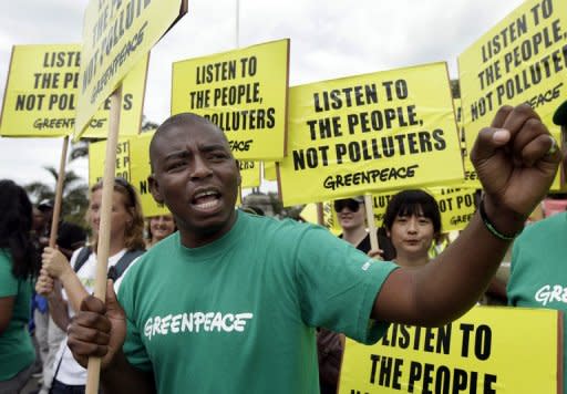 Greenpeace activists during a protest demanding for action to combat global warming in Durban on December 3. The 12-day, 194-nation talks, under the UN Framework Convention on Climate Change enter a high-level phase on Tuesday