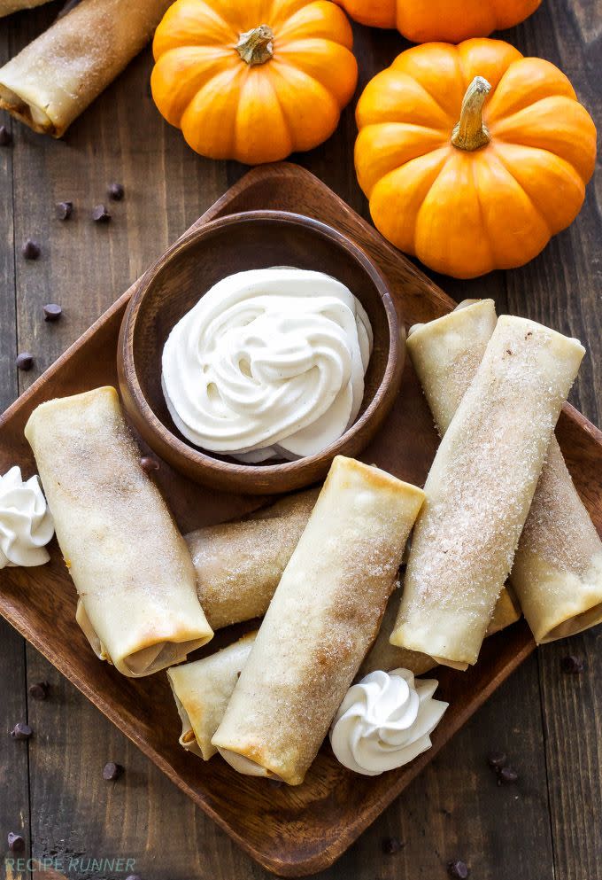 <p>Don't forget to dip these gooey, messy, delicious pumpkin egg rolls in homemade whipped cream. </p><p><strong>Get the recipe at <a href="https://reciperunner.com/pumpkin-chocolate-chip-cheesecake-egg-rolls/" rel="nofollow noopener" target="_blank" data-ylk="slk:Recipe Runner;elm:context_link;itc:0;sec:content-canvas" class="link ">Recipe Runner</a>.</strong> </p>