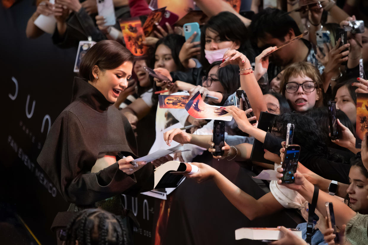 MEXICO CITY, MEXICO - FEBRUARY 6: Zendaya signs autographs to fans during the red carpet for the movie 'Dune: Part Two' at Auditorio Nacional on February 6, 2024 in Mexico City, Mexico. (Photo by Angel Delgado/Getty Images)