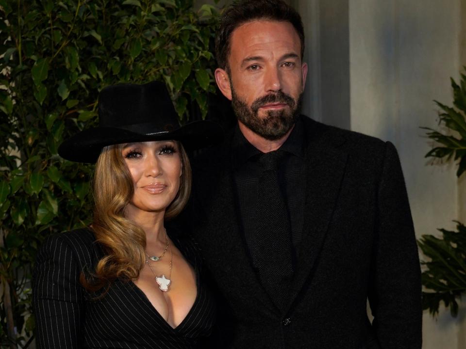 Jennifer Lopez, left, and Ben Affleck arrive at the Ralph Lauren Spring 2023 Fashion Experience on Thursday, Oct. 13, 2022, at The Huntington in Pasadena, Calif.