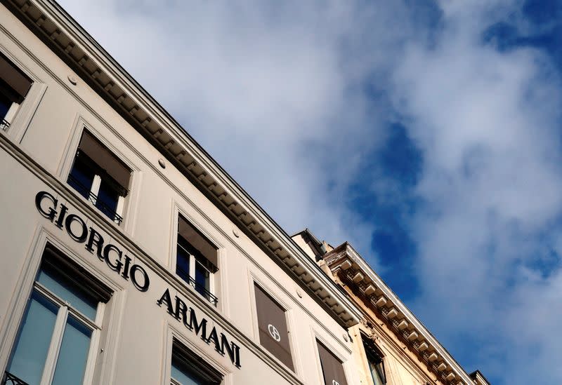 The logo of fashion house Armani is seen at the entrance of a store in Brussels