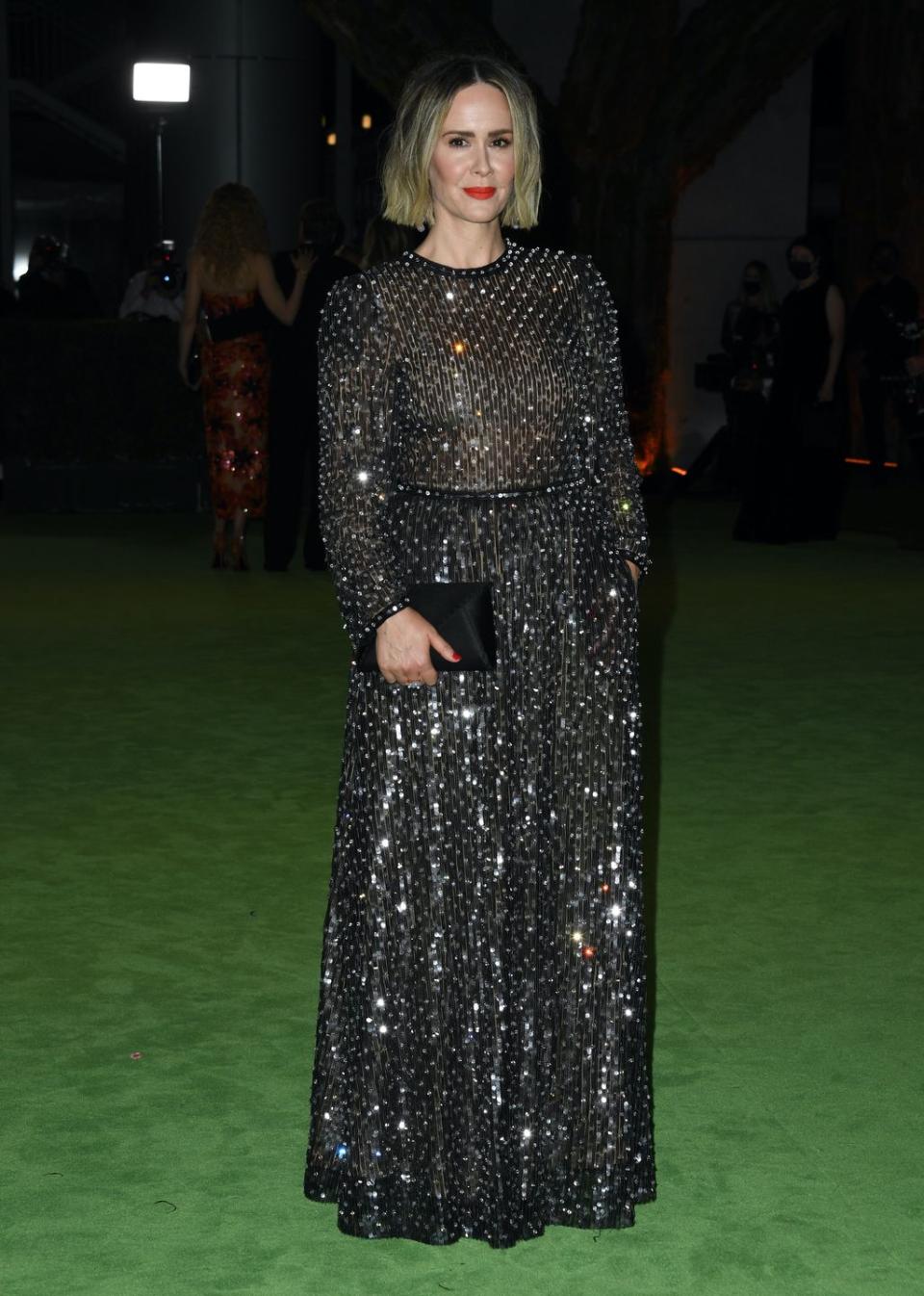 <p>in Giorgio Armani with a Tyler Ellis clutch</p>