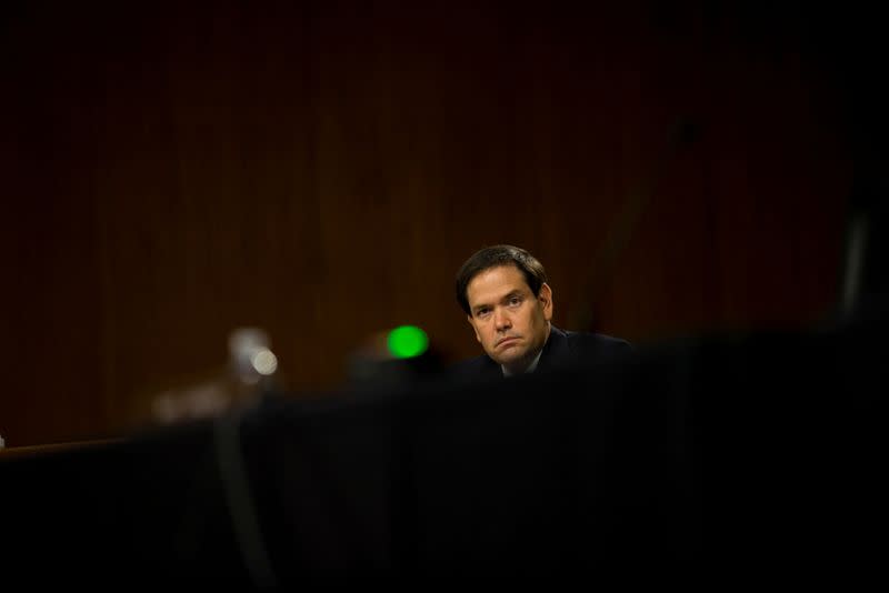 FILE PHOTO: U.S. Sen. Marco Rubio questions Rep. John Ratcliffe during a Senate Intelligence Committee nomination hearing, on Capitol Hill in Washington