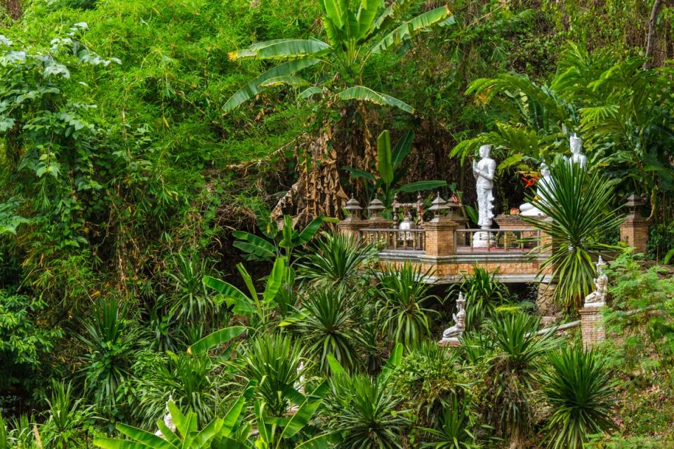 The forests and hills around the city hide temples such as Wat Pha Lat (iStock)