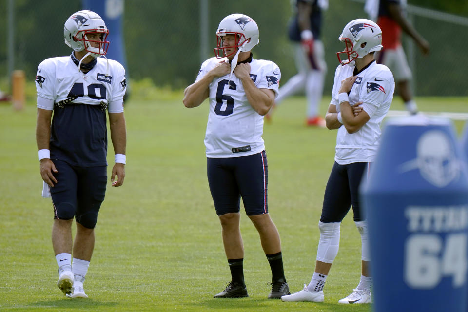 New England Patriots Long snapper Joe Cardona (49) kicker Nick Folk (6) and punter Jake Bailey, right, confer during an NFL football training camp practice, Tuesday, Aug. 25, 2020, in Foxborough, Mass. (AP Photo/Steven Senne, Pool)