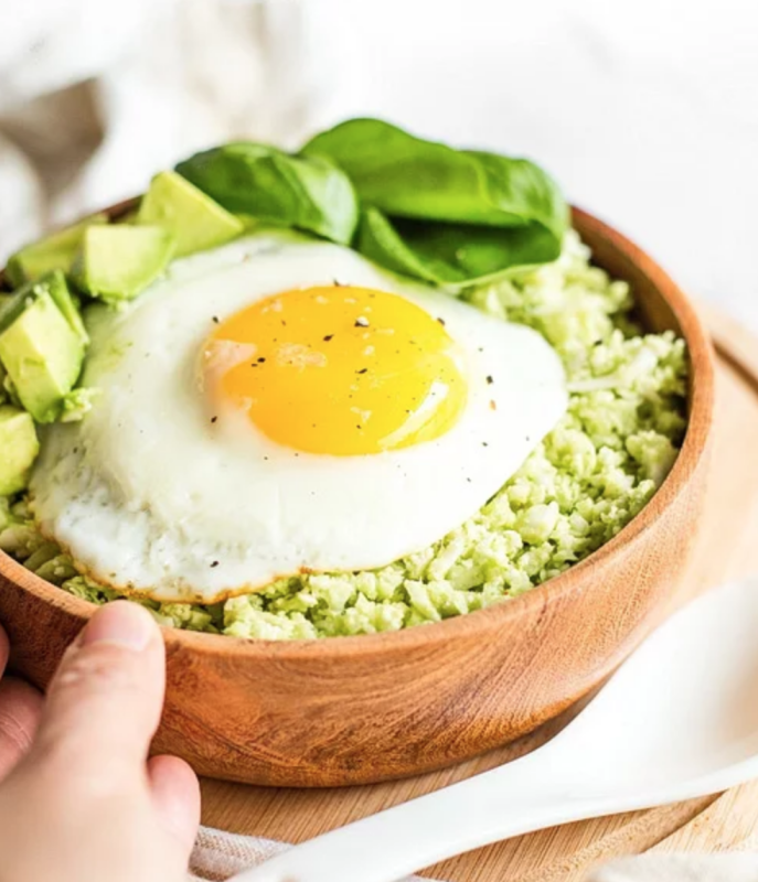 <p>Paleo Hacks</p><p>Wake up to this delicious keto low-carb breakfast bowl—a tasty pesto cauliflower rice topped with a fried egg, diced avocados and fresh spinach.</p><p><strong>Get the recipe: <a href="https://blog.paleohacks.com/keto-pesto-cauliflower-rice-bowl/" rel="nofollow noopener" target="_blank" data-ylk="slk:Keto Pesto Cauliflower Rice Bowl;elm:context_link;itc:0;sec:content-canvas" class="link rapid-noclick-resp">Keto Pesto Cauliflower Rice Bowl</a></strong></p>