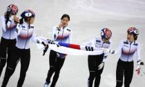 Short Track Speed Skating Events - Pyeongchang 2018 Winter Olympics - Women's 3000 m Final - Gangneung Ice Arena - Gangneung, South Korea - February 20, 2018. Kim Alang, Shim Sukhee, Minjeong Choi and Kim Yejin of South Korea celebrate. REUTERS/Phil Noble