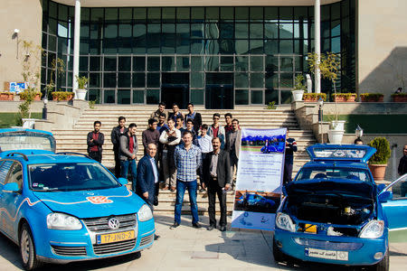 Dutch adventurer Wiebe Wakker on his electric car journey from the Netherlands to Australia, at KNT University of Technology in Tehran, Iran November, 2016 in this picture obtained from social media. Picture taken November, 2016. WIEBE WAKKER/PLUG ME IN PROJECT/via REUTERS