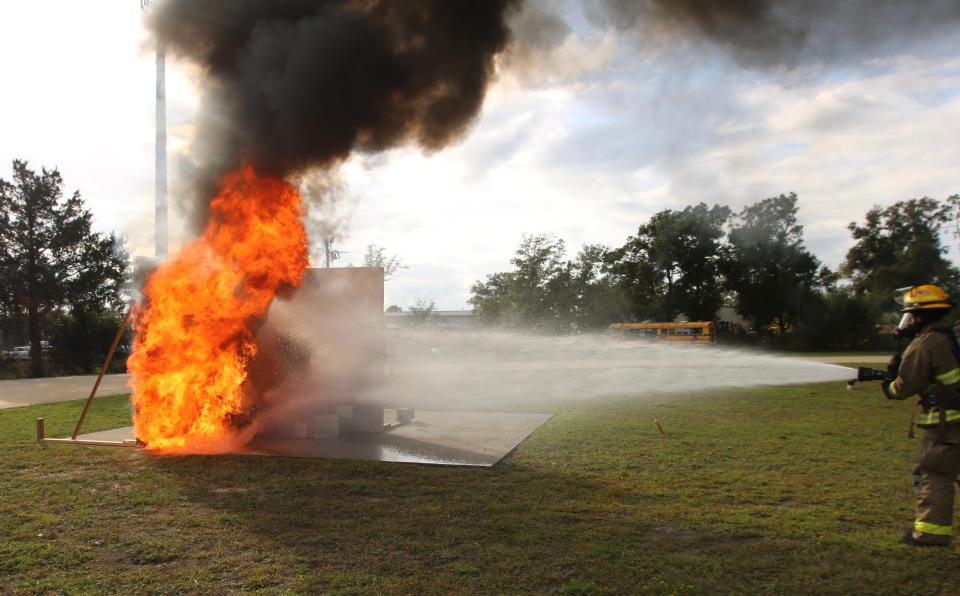 During the demonstration Tuesday, the tree fire quickly spread to surrounding furniture.