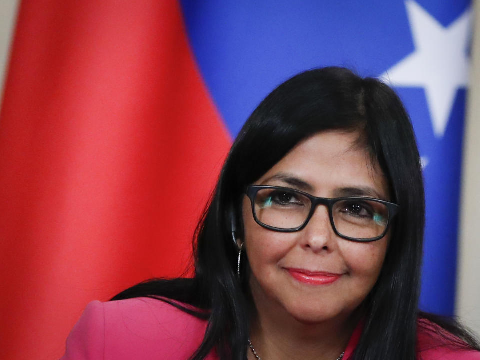 Venezuela's Vice President Delcy Rodriguez smiles during her and Russian Foreign Minister Sergey Lavrov's joint news conference following the talks in Moscow, Russia, Friday, March 1, 2019. Venezuela’s vice president is visiting Russia, voicing hope for stronger ties with Moscow amid the U.S. pressure. (AP Photo/Pavel Golovkin)