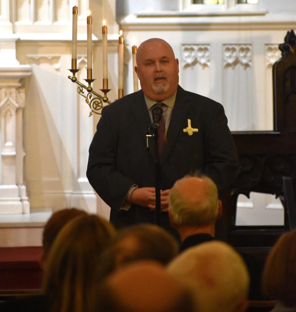 Mayor Mike Snider recalls stories from the 2002 tornado that devastated parts of Port Clinton. He spoke during the community Good Friday service on March 29 at St. John Lutheran Church in Port Clinton.