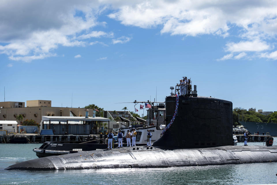 In this photo provided by U.S. Navy, the Virginia-class fast-attack submarine USS Illinois (SSN 786) returns home to Joint Base Pearl Harbor-Hickam from a deployment in the 7th Fleet area of responsibility on Sept. 13, 2021.Australia decided to invest in U.S. nuclear-powered submarines and dump its contract with France to build diesel-electric submarines because of a changed strategic environment, Prime Minister Scott Morrison said on Thursday, Sept. 16, 2021. (Mass Communication Specialist 1st Class Michael B. Zingaro/U.S. Navy via AP)