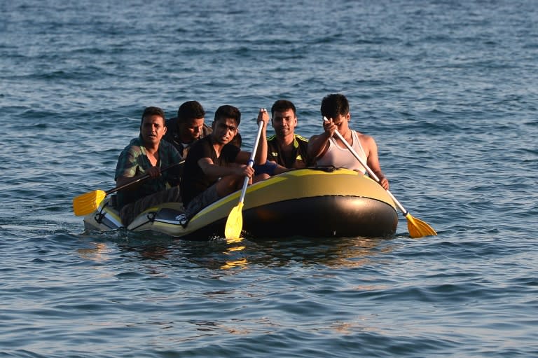 A group of migrants arriving at the Greek island of Kos from Turkey on August 18, 2015