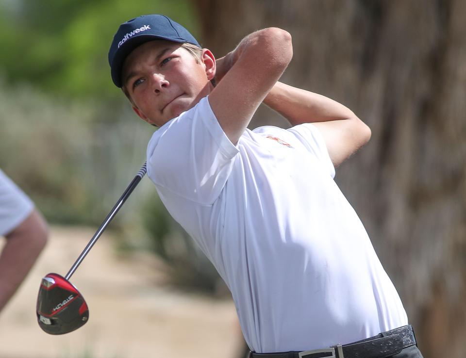 Cash Tompoles tees off for Palm Desert High School during their match against Shadow Hills at Desert Willow Golf Resort in Palm Desert, Calif., April 18, 2023. 