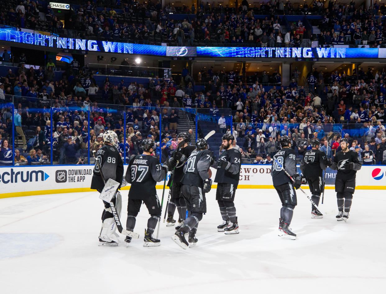 TAMPA, FL - FEBRUARY 29: The Tampa Bay Lightning celebrate the win against the Calgary Flames at Amalie Arena on February 29, 2020 in Tampa, Florida. (Photo by Scott Audette /NHLI via Getty Images)