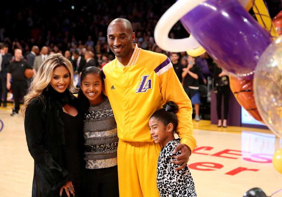 PHOTO: In this Dec. 19, 2014, file photo, Kobe Bryant of the Los Angeles Lakers poses with wife Vanessa and daughters Gianna (L) and Natalia before the game with the Oklahoma City Thunder, at Staples Center, in Los Angeles. (Stephen Dunn/Getty Images, FILE)