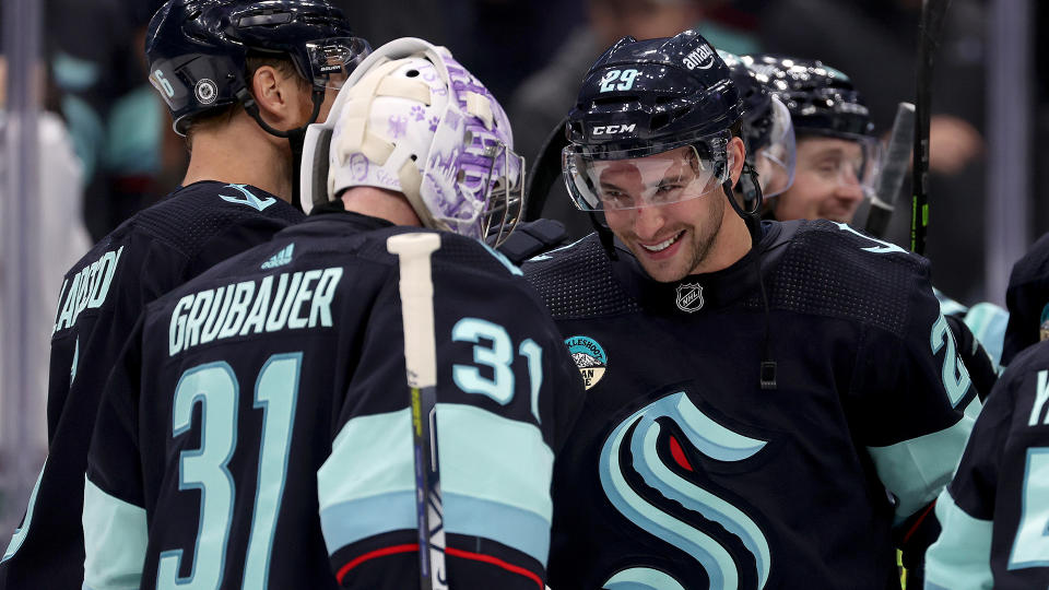 The Kraken do a good job of protecting Philipp Grubauer from difficult shots. (Photo by Steph Chambers/NHL Getty Images)