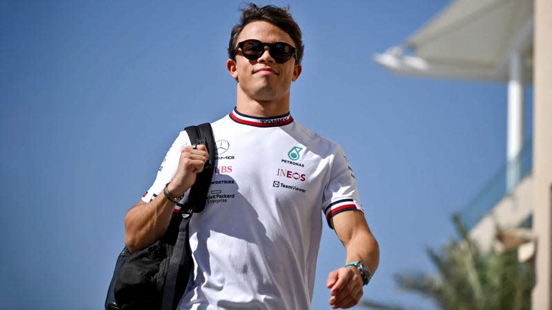 A photo of Nyck de Vries walking through the F1 paddock in Abu Dhabi. 