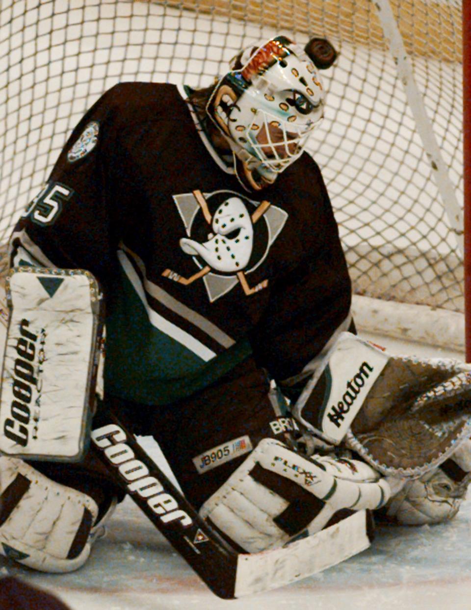 Mighty Ducks goalie, Mikhail Shtalenkov is beaten by Red Wings forward Vyacheslav Kozlov's shot in the third period of overtime. in the Red Wings' 3-2 win in Game 2 of the Western Conference semifinals on May 4, 1997, at Joe Louis Arena.