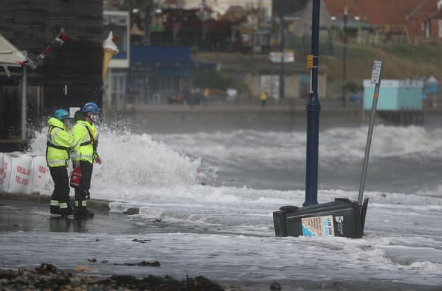 Members of the Coastguard monitor the conditions at Swanage 