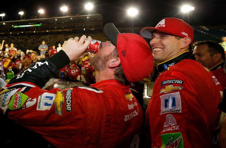 Dale Earnhardt Jr. takes a sip of beer after his final Cup Series race. (NBC Sports)