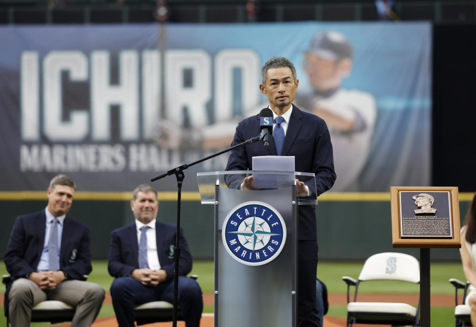 Former Seattle Mariners player Ichiro Suzuki is inducted into the Mariners Hall of Fame during a ceremony before a baseball game between the Mariners and the Cleveland Guardians, Saturday, Aug. 27, 2022, in Seattle. Ichiro is a 10-time All-Star and American League Rookie of the Year in 2001. (AP Photo/John Froschauer)