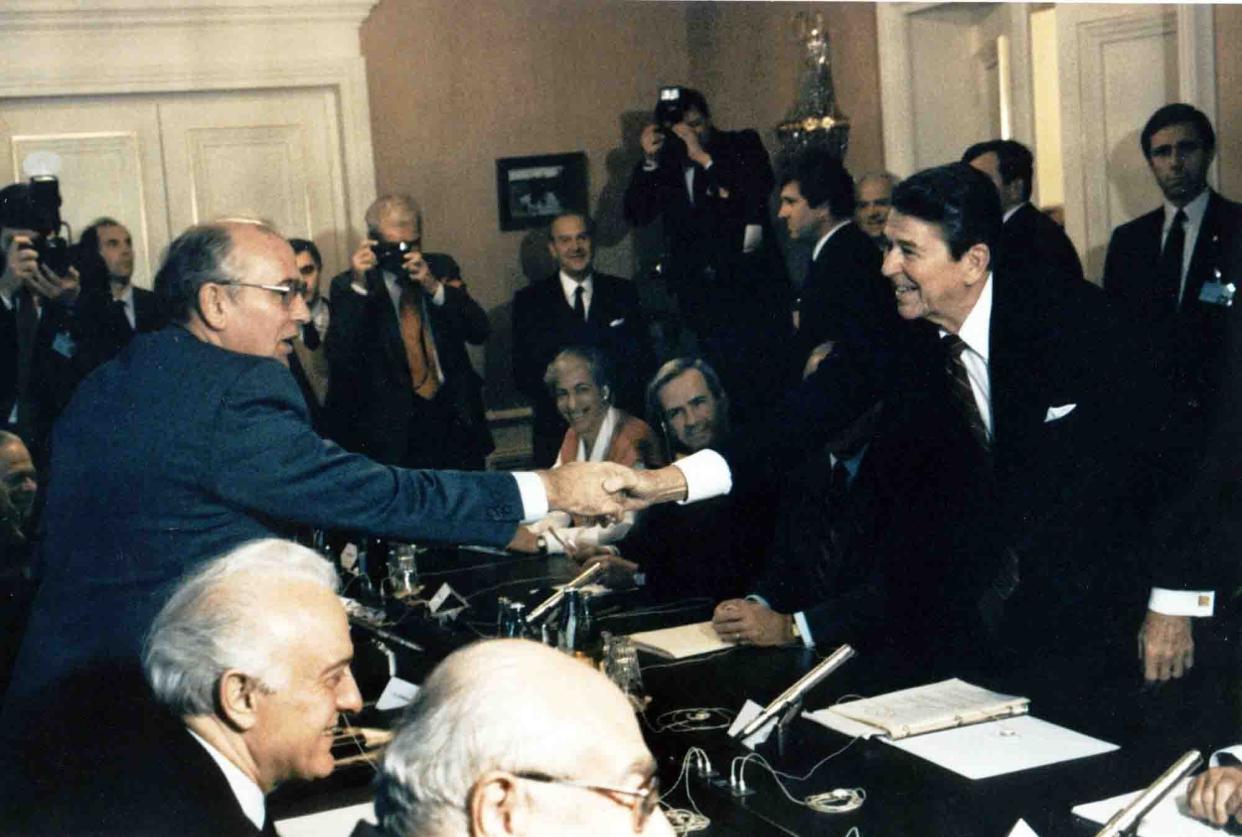 Soviet leader Mikhail Gorbachev, left, shakes hands with U.S. President Ronald Reagan at the Geneva conference in November 1985. 