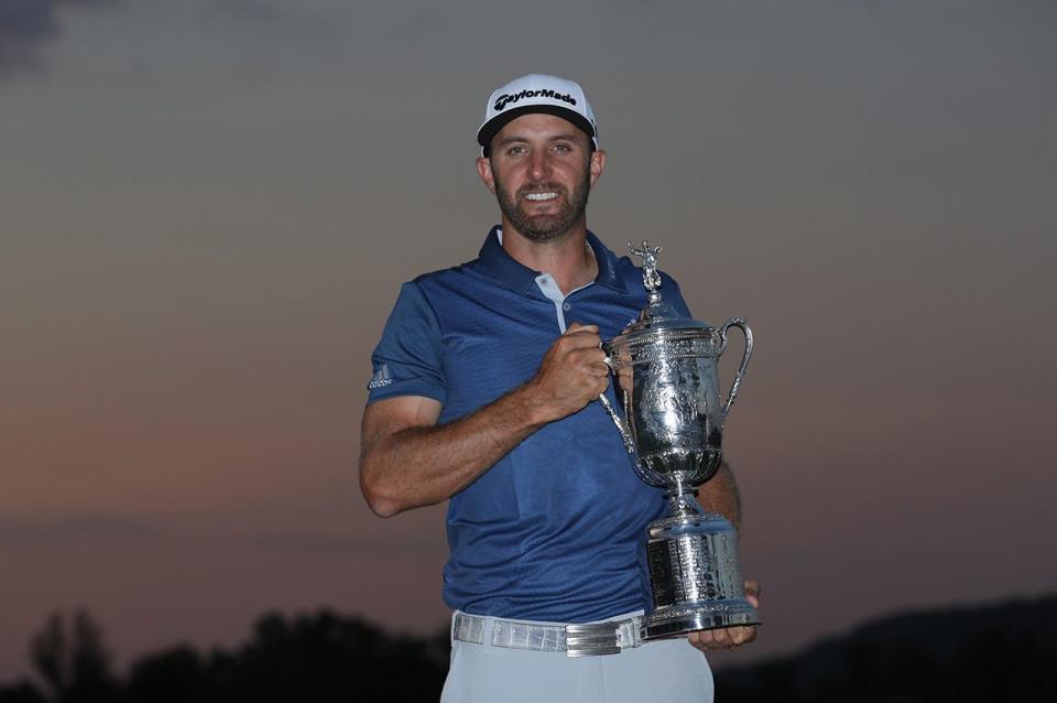 OAKMONT, PA - JUNE 19: Dustin Johnson of the United States poses with the winner's trophy after winning the U.S. Open at Oakmont Country Club on June 19, 2016 in Oakmont, Pennsylvania. (Photo by Sam Greenwood/Getty Images)