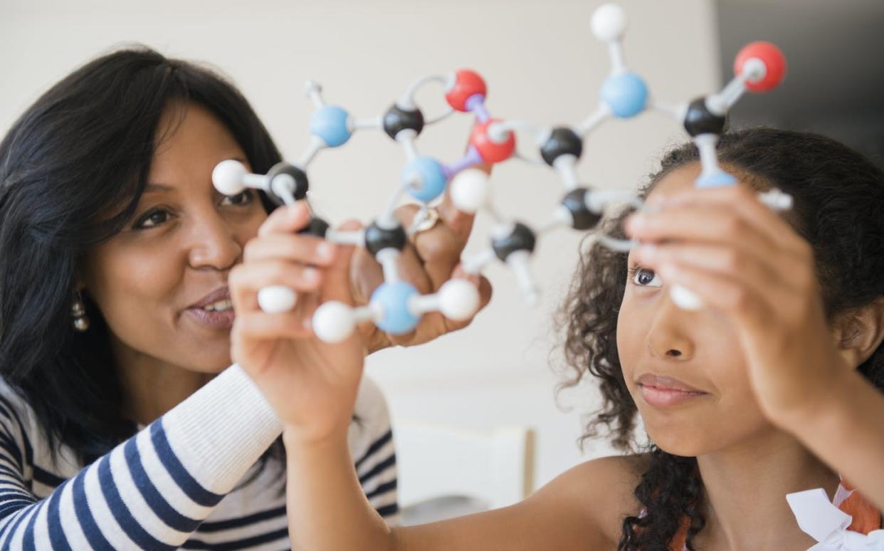 <span class="caption">Not all students have equal access to gifted and talented services.</span> <span class="attribution"><a class="link " href="https://www.gettyimages.com/detail/photo/mother-and-daughter-examining-molecular-model-royalty-free-image/597315623" rel="nofollow noopener" target="_blank" data-ylk="slk:JGI/Jamie Grill via Getty Images;elm:context_link;itc:0;sec:content-canvas">JGI/Jamie Grill via Getty Images</a></span>