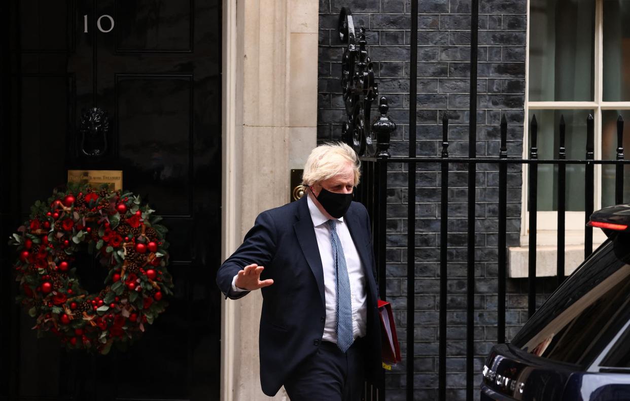 Boris Johnson quittant le numéro 10 Downing Street, le 8 décembre 2021. - Adrian DENNIS / AFP