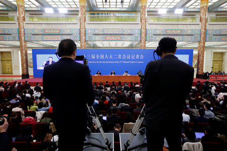 Chinese Premier Li Keqiang attends a news conference following the closing session of the National People's Congress (NPC) at the Great Hall of the People in Beijing, China March 15, 2019. REUTERS/Jason Lee