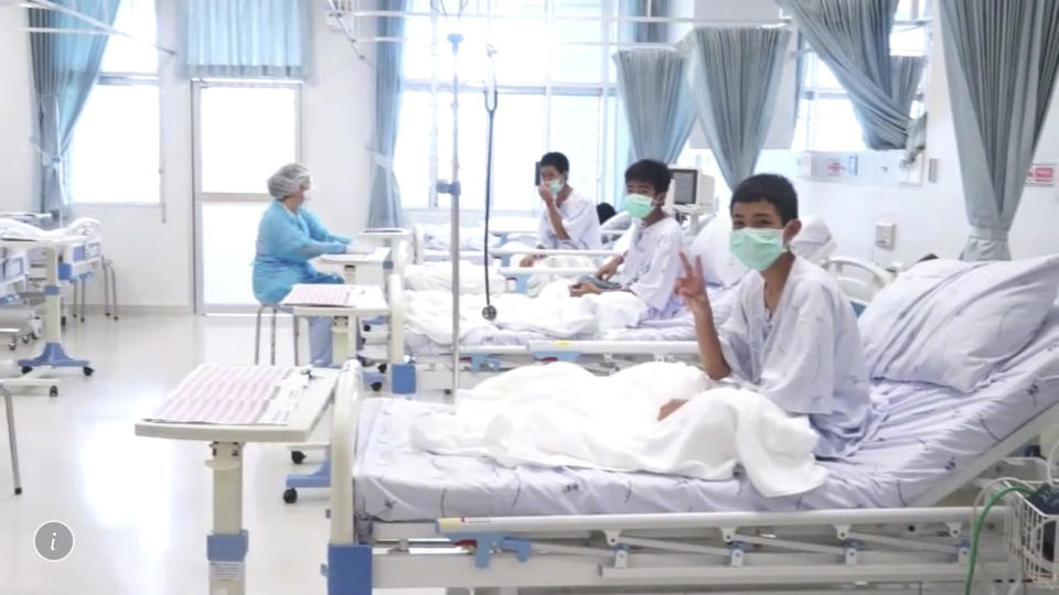 Three of the 12 boys are seen recovering in their hospital beds after being rescued from the flooded cave. Source: AP