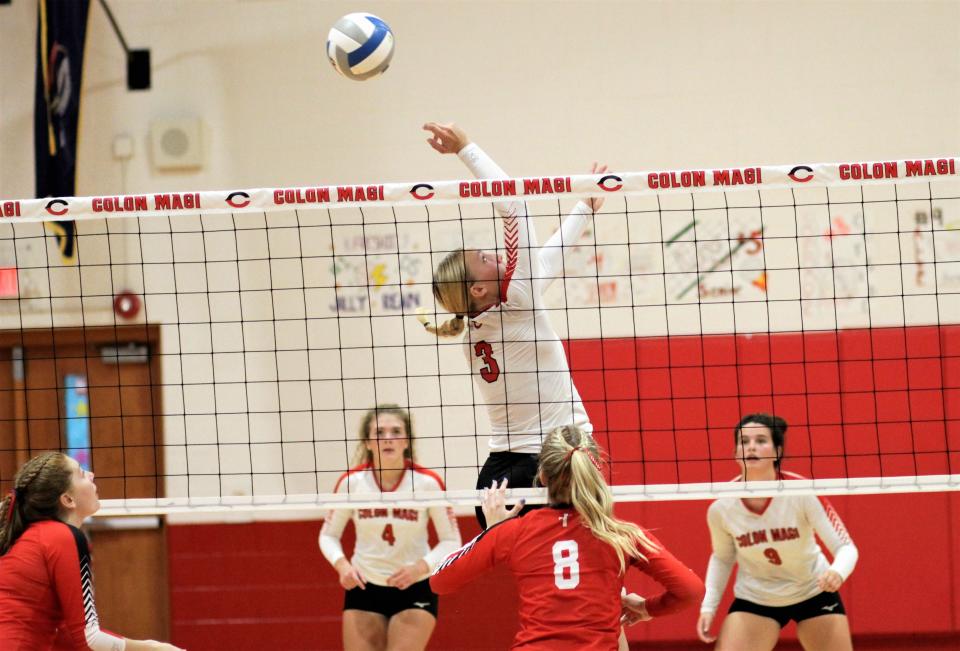 Reese Williams of Colon flips a ball back over the net against Battle Creek St. Philip on Tuesday.