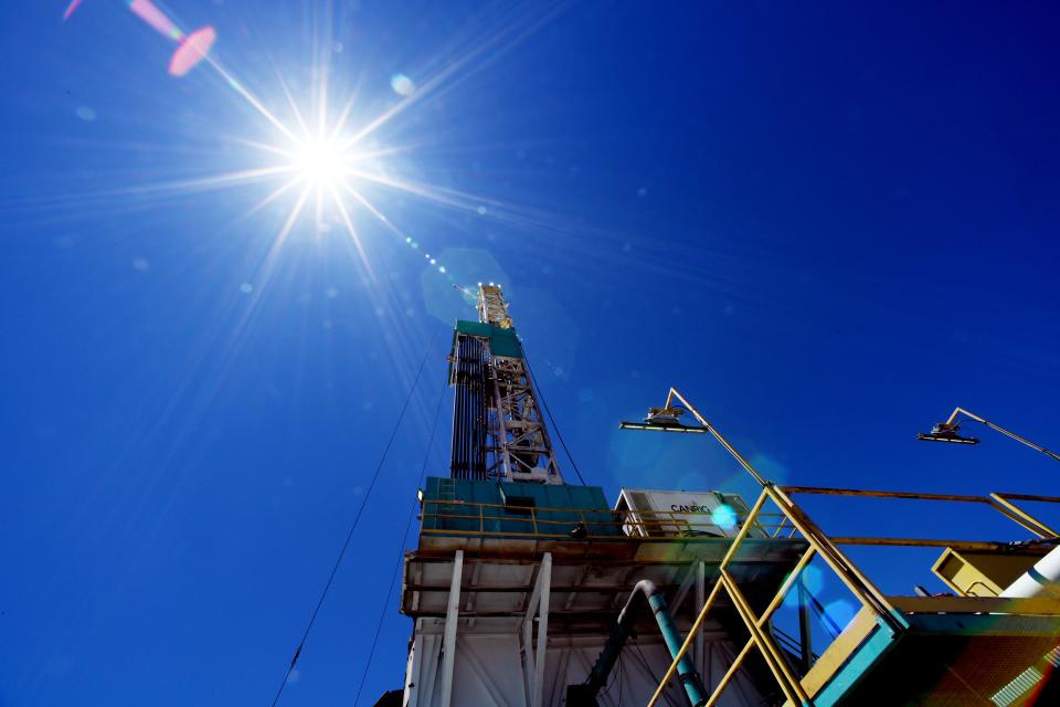 The sun beats down on the rig as a group of media take part in a tour of drilling rig at the FORGE geothermal demonstration sight near Milford on Thursday, July 6, 2023. | Scott G Winterton, Deseret News