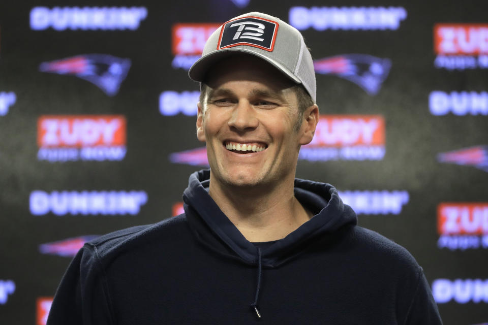 New England Patriots quarterback Tom Brady smiles while taking questions from reporters following an NFL football practice, Wednesday, Nov. 20, 2019, in Foxborough, Mass. (AP Photo/Steven Senne)