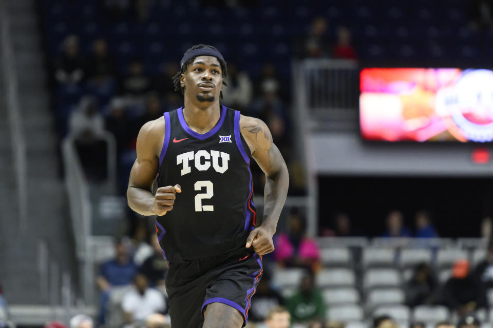 TCU forward Emanuel Miller runs downcourt during first -half NCAA college basketball game action against Clemson in the Hall of Fame Series in Toronto, Saturday, Dec. 9, 2023. (Christopher Katsarov/The Canadian Press via AP)