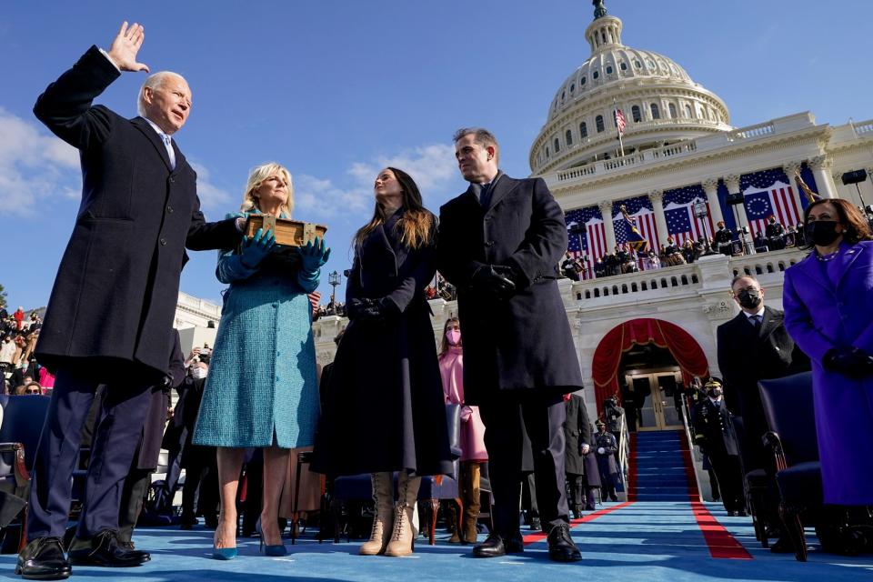 <p>As Joe Biden took his oath of office, he was <a href="https://people.com/politics/joe-and-jill-biden-love-story/" rel="nofollow noopener" target="_blank" data-ylk="slk:accompanied by wife Jill;elm:context_link;itc:0;sec:content-canvas" class="link ">accompanied by wife Jill</a> and their children Ashley, 39, and Hunter, 50.</p>