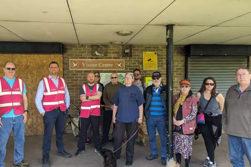 South Norwood residents outside the boarded up visitors centre