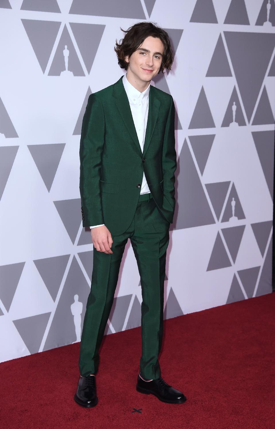 <p>The ‘Ladybird’ actor looked dashing in a green Gucci suit, sans tie. [Photo: Getty] </p>