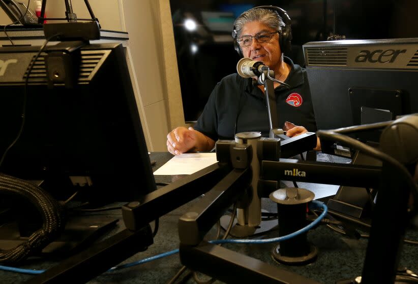 LOS ANGELES, CALIF. NOV. 5, 2022. David Hernadez moderates a conservative political radio talk show at the studios of AM Radio 870 in Southern California on Saturday night, Nov. 5, 2022. Hernandez is the chairman of the Los Angeles County Hispanic Republican Club. (Luis Sinco / Los Angeles Times)