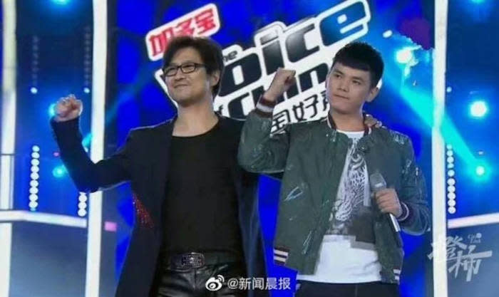 Zhang with his mentor Wang Feng