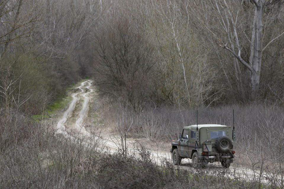 A Greek Army vehicle patrols near the village of Marasia, Greece, on the Greek-Turkish border on Thursday, March 5, 2020. Turkey has vowed to seek justice for a migrant it says was killed on the border with Greece after Greek authorities fired tear gas and stun grenades to push back dozens of people attempting to cross over. Greece had denied that anyone was killed in the clashes. (AP Photo/Giannis Papanikos)