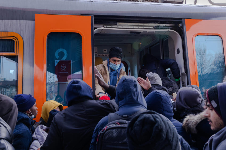 Refugees at the Przemysl train station attempt to board a crowded train to Krakow on March 1.<span class="copyright">Natalie Keyssar for TIME</span>