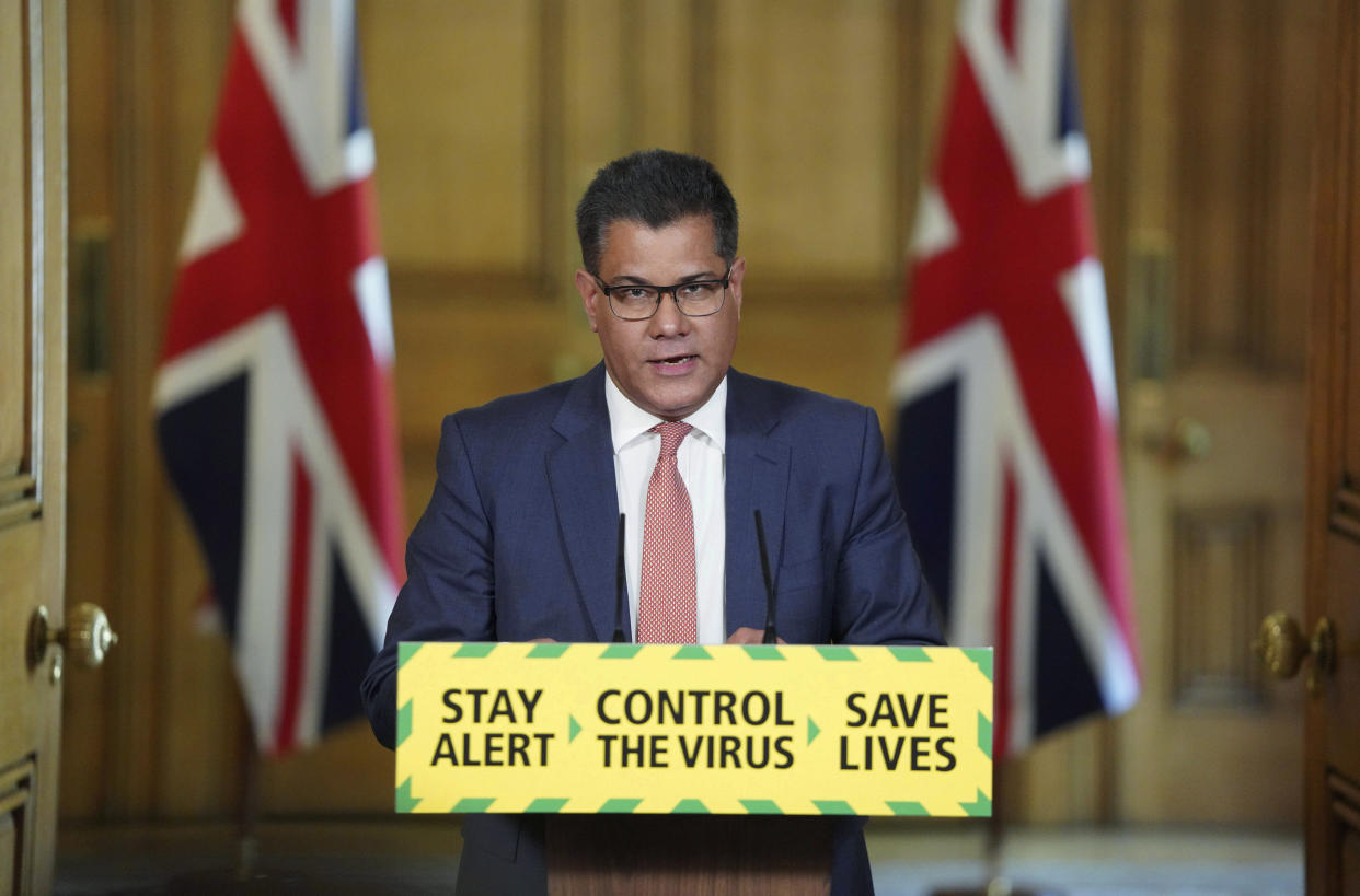 In this photo issued by 10 Downing Street, Britain's Business, Energy and Industrial Strategy Secretary Alok Sharma speaks during a coronavirus media briefing in Downing Street, London, Tuesday, May 12, 2020. (Pippa Fowles/10 Downing Street via AP)