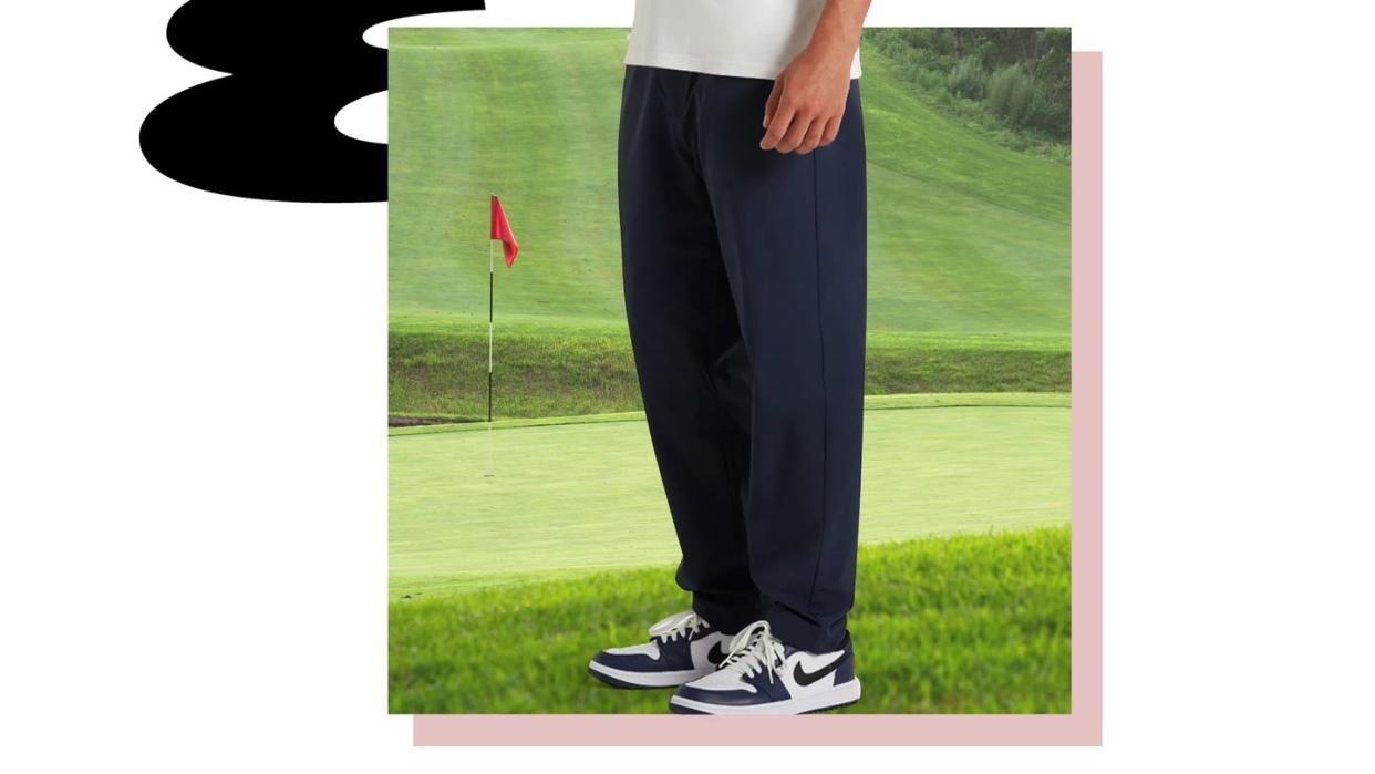 a person standing on a golf course